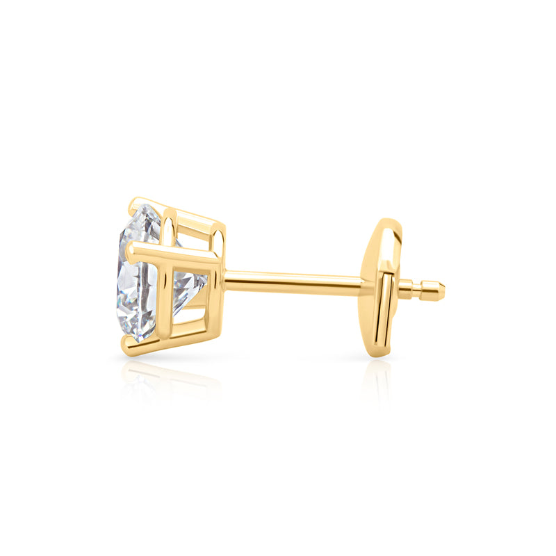 Pair of Studs With 4 Ct. ROUND Cut Solitaire Diamonds Secured In Classic Four Prong Basket