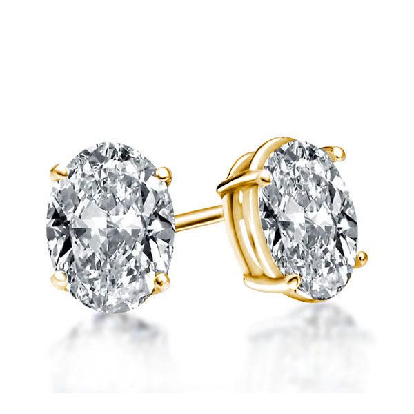 Pair of Studs With 2.0 Ct. OVAL Shaped Diamonds Set In A Classic Four Prong Basket