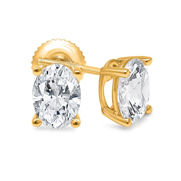 Pair of Studs With 4 Ct. OVAL Cut Solitaire Diamonds Secured In Classic Four Prong Basket