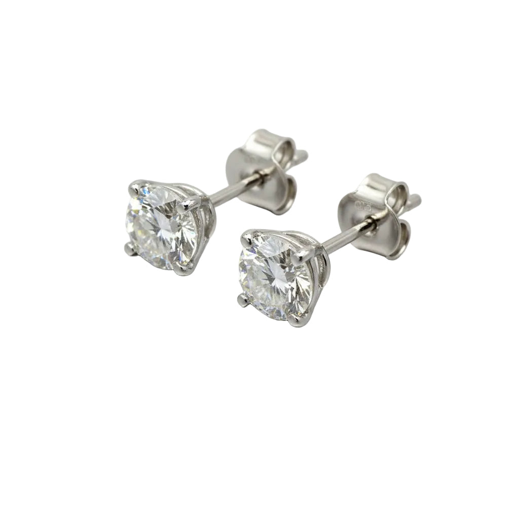 Pair of Studs With 2.0 Ct. ROUND Cut Solitaire Diamonds Set In A Classic Four Prong Basket Setting