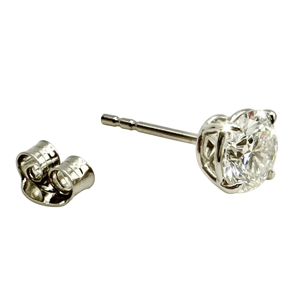 Pair of Studs With 1.5 Ct. ROUND Excellent Cut Diamonds Set In A Classic Four Prong Basket