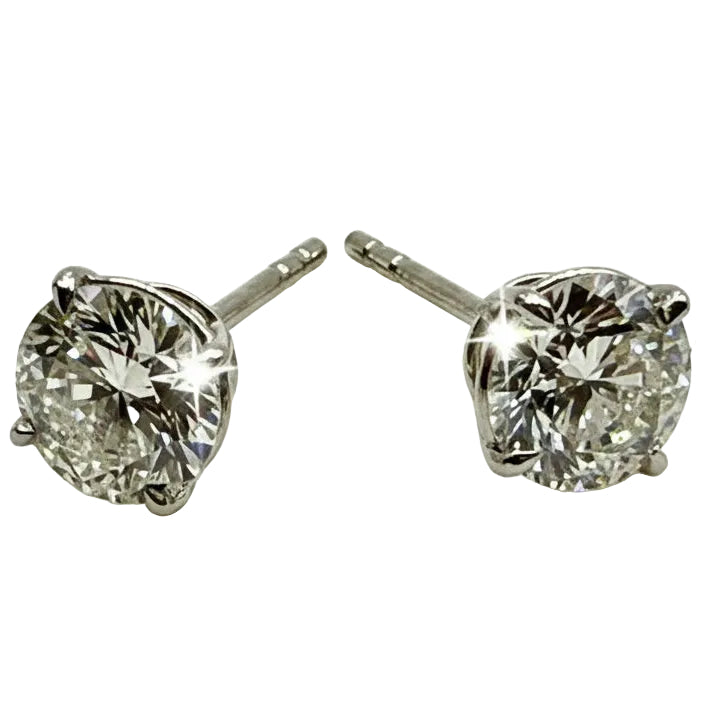 Pair of Studs With 2.0 Ct. ROUND Cut Solitaire Diamonds Set In A Classic Four Prong Basket Setting