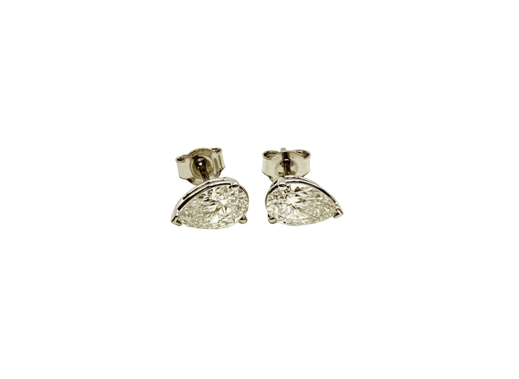 Pair of Studs With 0.50 Ct. PEAR Shaped Excellent Cut Stones Set In A Classic Three Prong Basket