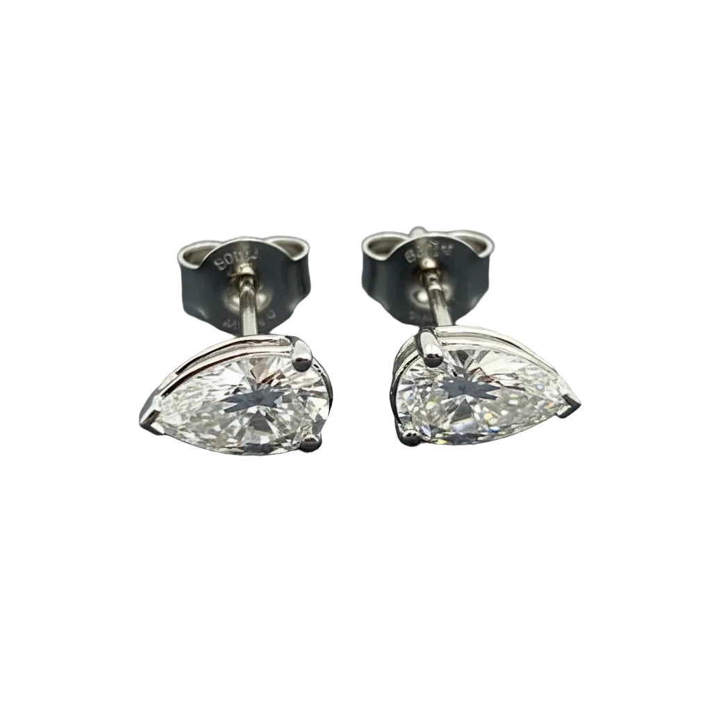 Pair of Studs With 1.0 Ct. PEAR Shaped Excellent Cut Stones Set In A Classic Three Prong Basket