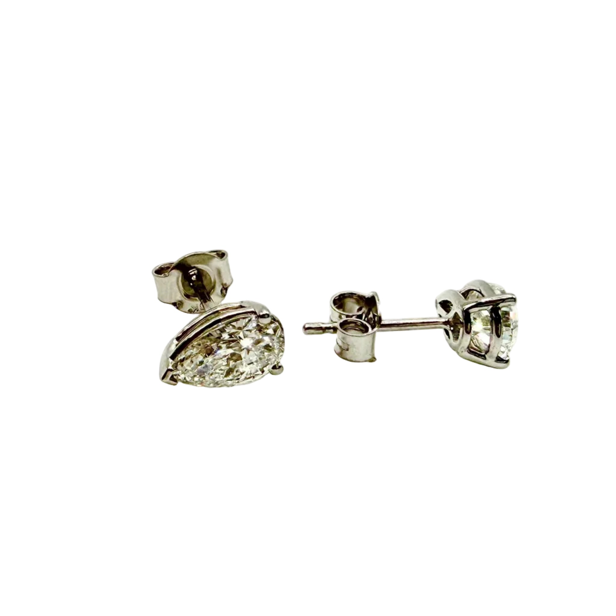 Pair of Studs With 1.5Ct. PEAR Shaped Excellent Cut Stones Set In A Classic Three Prong Basket