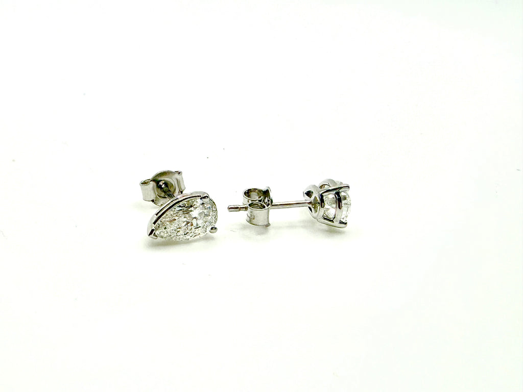 Pair of Studs With 1.5Ct. PEAR Shaped Excellent Cut Stones Set In A Classic Three Prong Basket
