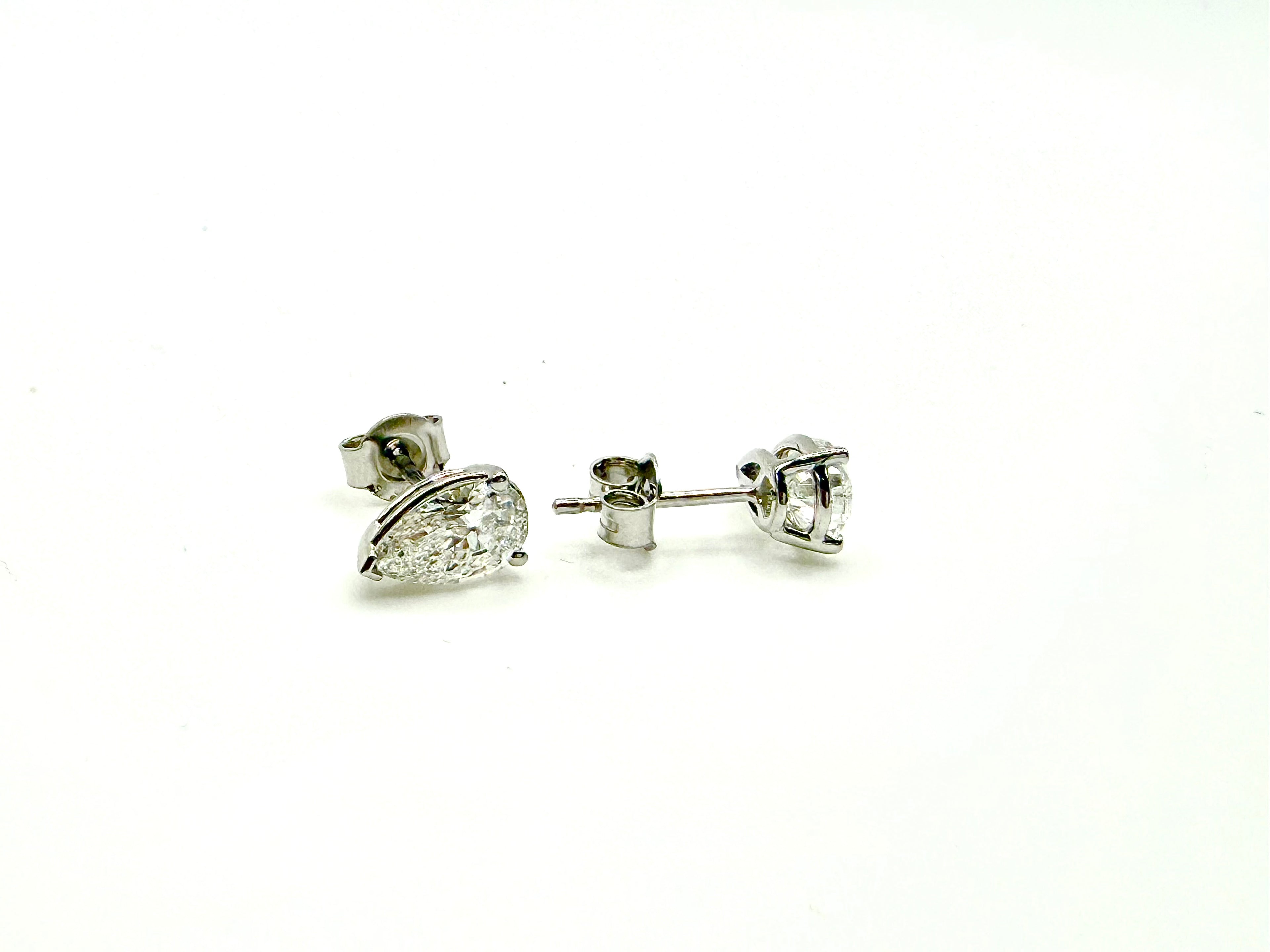 Pair of Studs With 1.5Ct. PEAR Shaped Excellent Cut Stones Set In A Classic Three Prong Basket