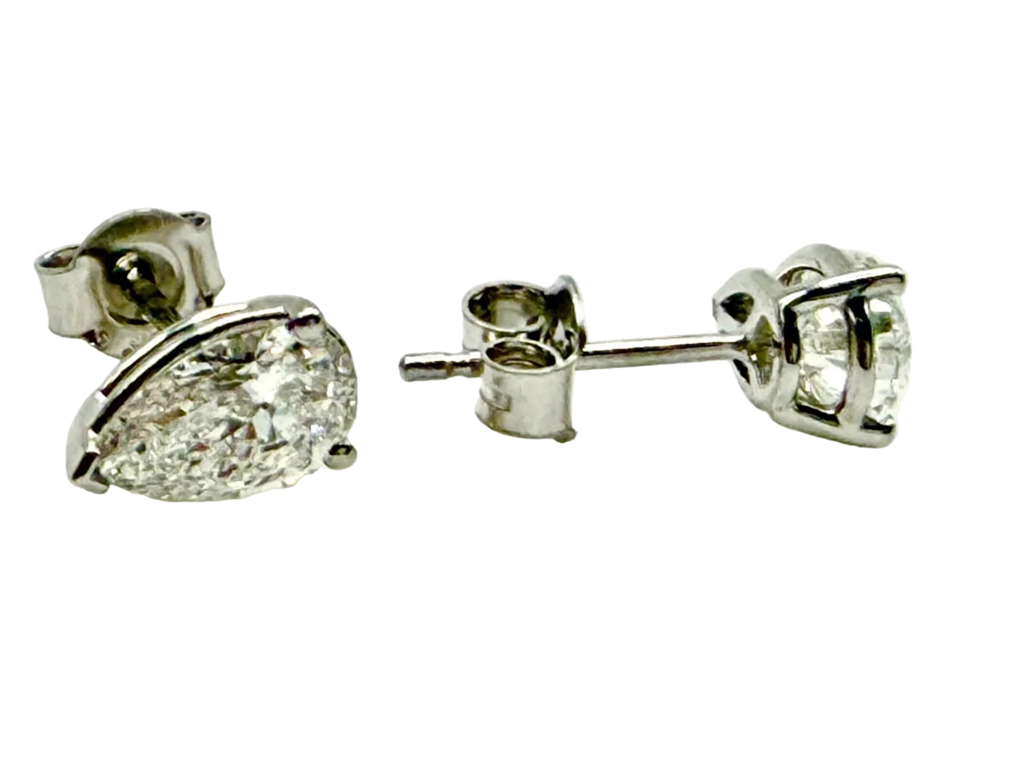 Pair of Studs With 2.0 Ct. PEAR Shaped Solitaire Diamonds Set In A Classic Three Prong Basket Setting