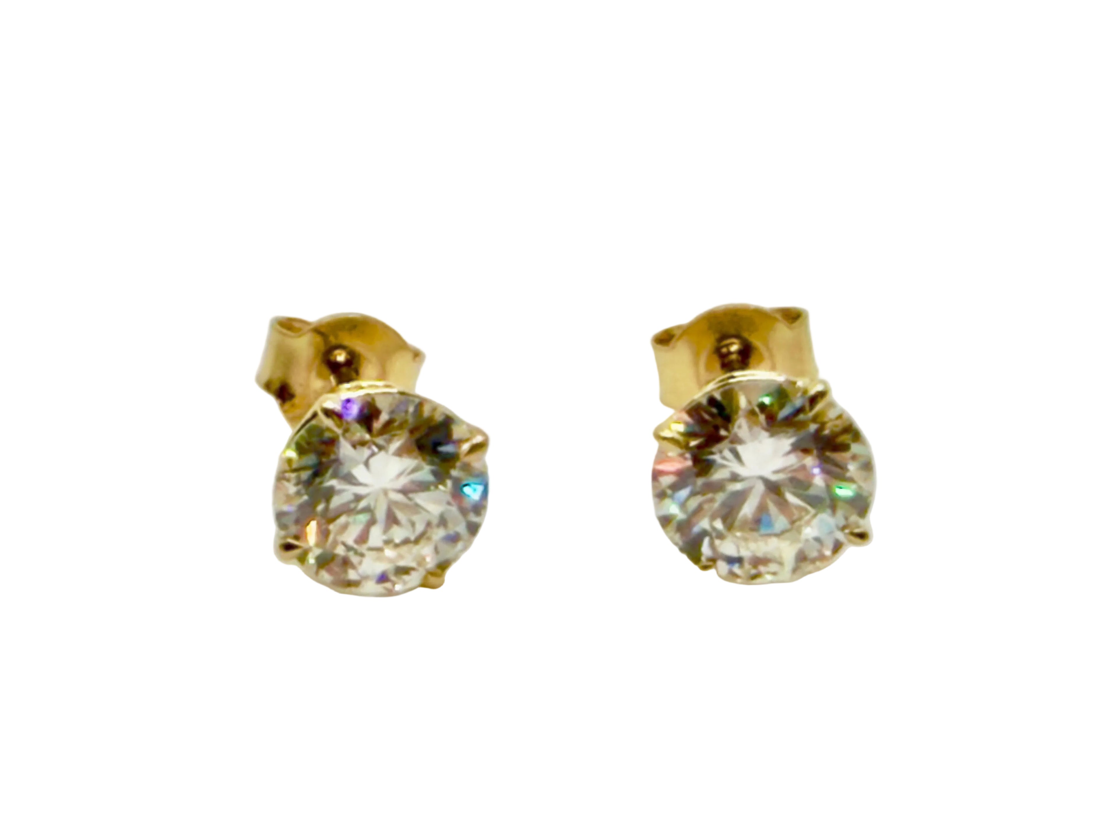 Pair of 3 Ct. Round Cut Solitaire Diamond Stud Earrings Secured in Classic 4 Prong Basket Setting