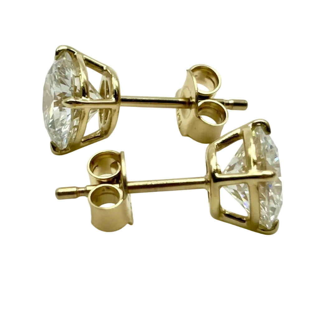 Pair of 3 Ct. Round Cut Solitaire Diamond Stud Earrings Secured in Classic 4 Prong Basket Setting
