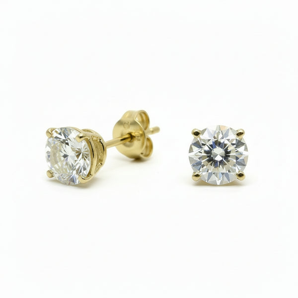 Pair of Studs With 1.0 Ct. ROUND Cut Solitaire Diamonds Set In A Classic Four Prong Basket Setting