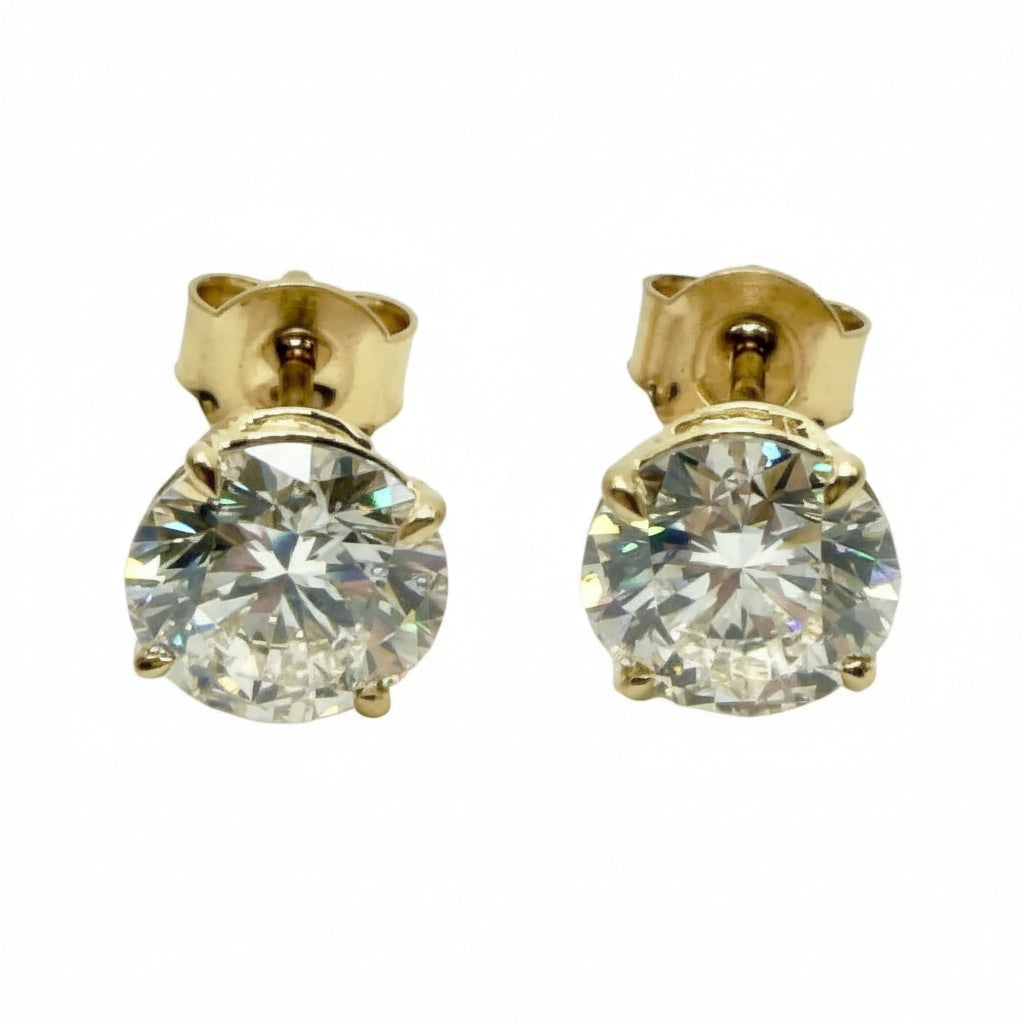 Pair of 3 Ct. Round Cut Solitaire Diamond Stud Earrings Secured in Classic 4 Prong Basket Setting