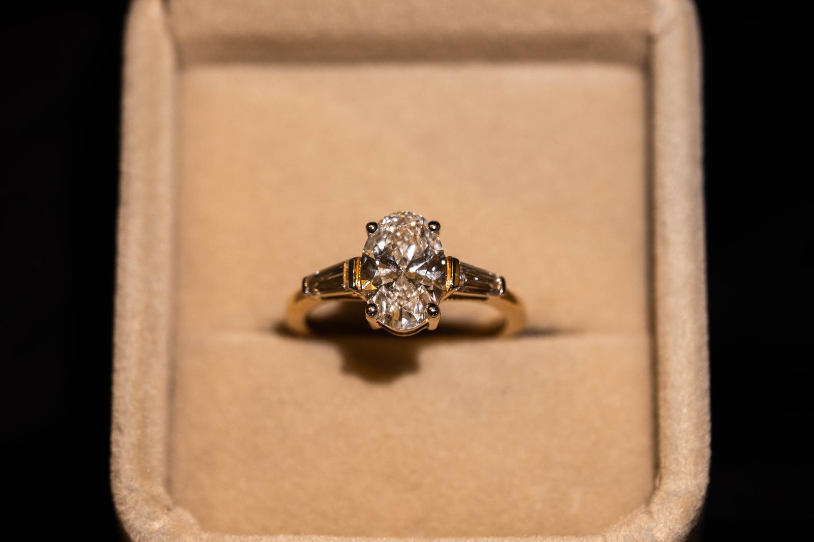 1.9 Ct. OVAL Shaped Classic Trilogy Ring With Tapered Baguettes On Sides