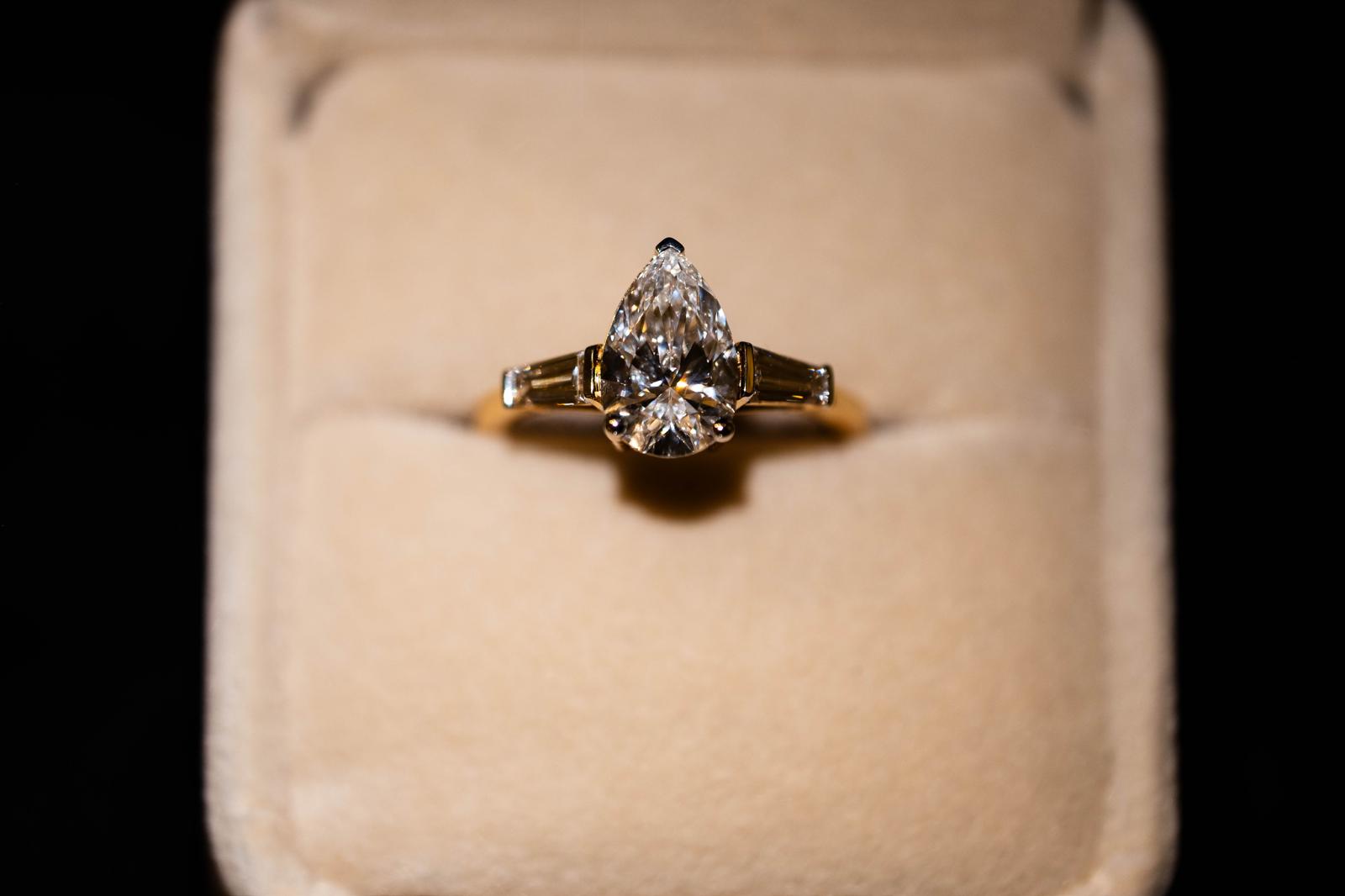 1.9 Ct. PEAR Shaped Classy Diamond Ring With Tapered Baguettes On Sides