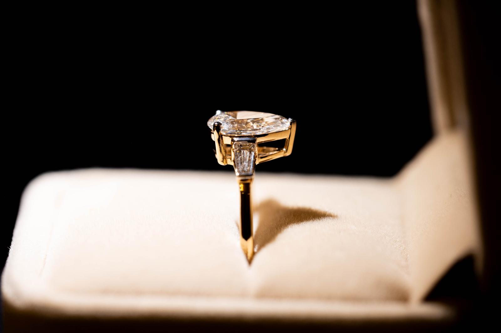 2.4 Ct. PEAR Shaped Classy Diamond Ring With Tapered Baguettes On Sides