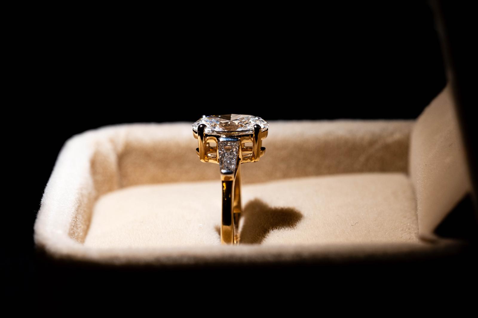 1.9 Ct. OVAL Shaped Classic Trilogy Ring With Tapered Baguettes On Sides